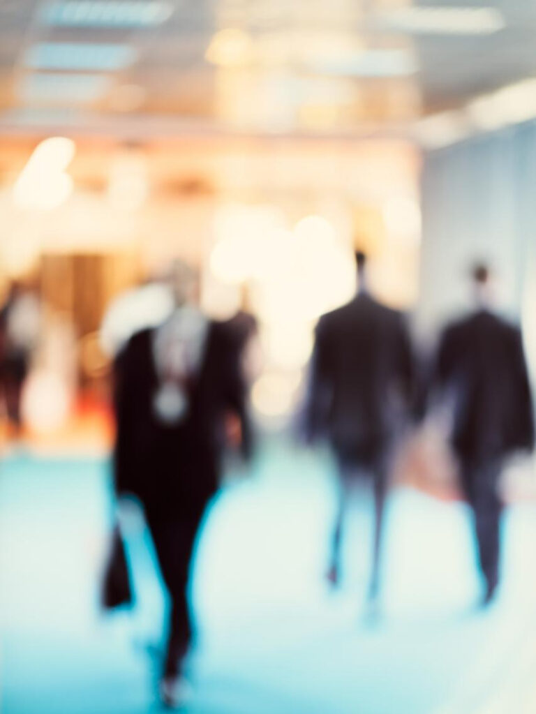 people walking to work society has coupled your self-worth and happiness to productivity and doing